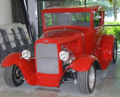 Red antique completely restored at Camarillo Auto Body